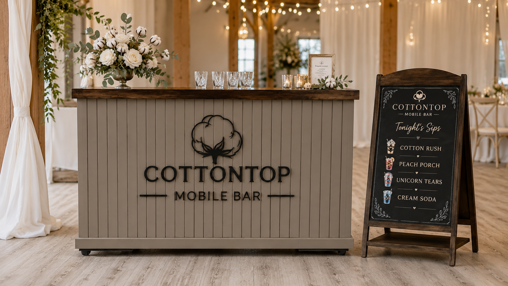 CottonTop Mobile Bar set for an elegant event beside a personalized framed chalkboard menu